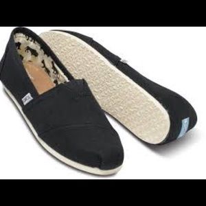 Toms black canvas with cream soles!